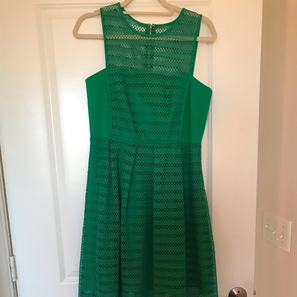 Dress never worn. Tea length overlay.